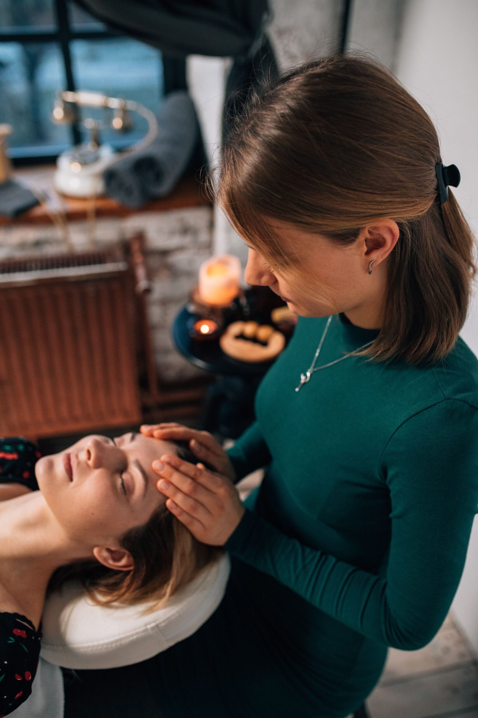 Wellness practitioner supporting a client